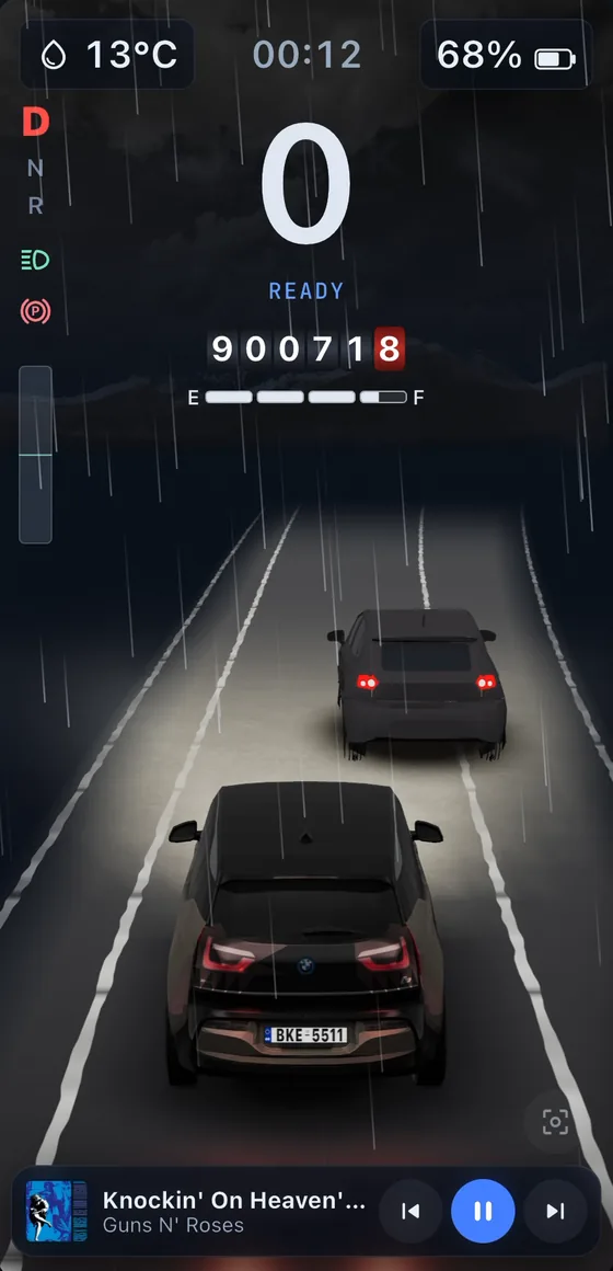 The dashboard with the car ahead drawn further away