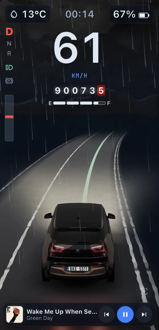 The dashboard at 61 km/h with the drawn road bending left
