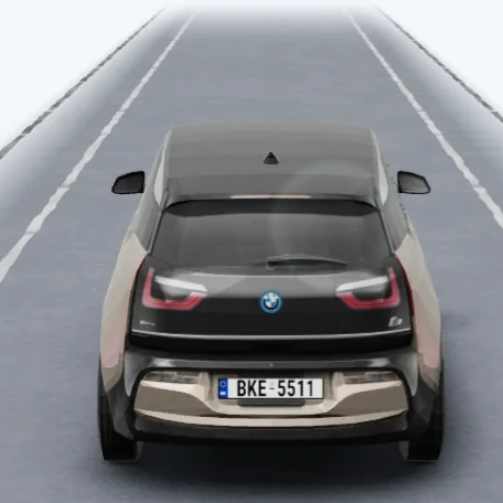 The i3 on a pale road in daylight